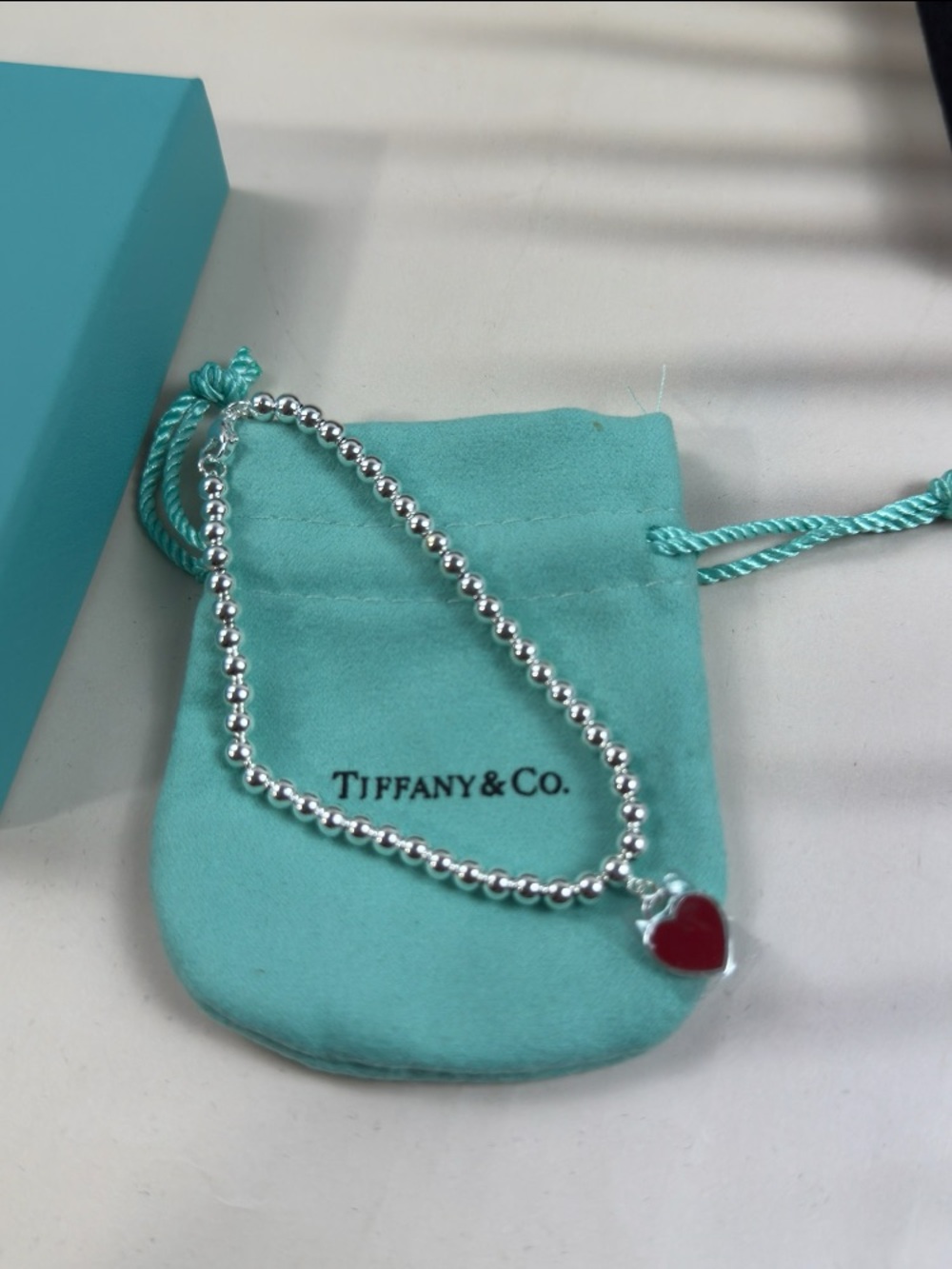 Tiffany & Co. Silver Bead Bracelet with Red Heart Charm
